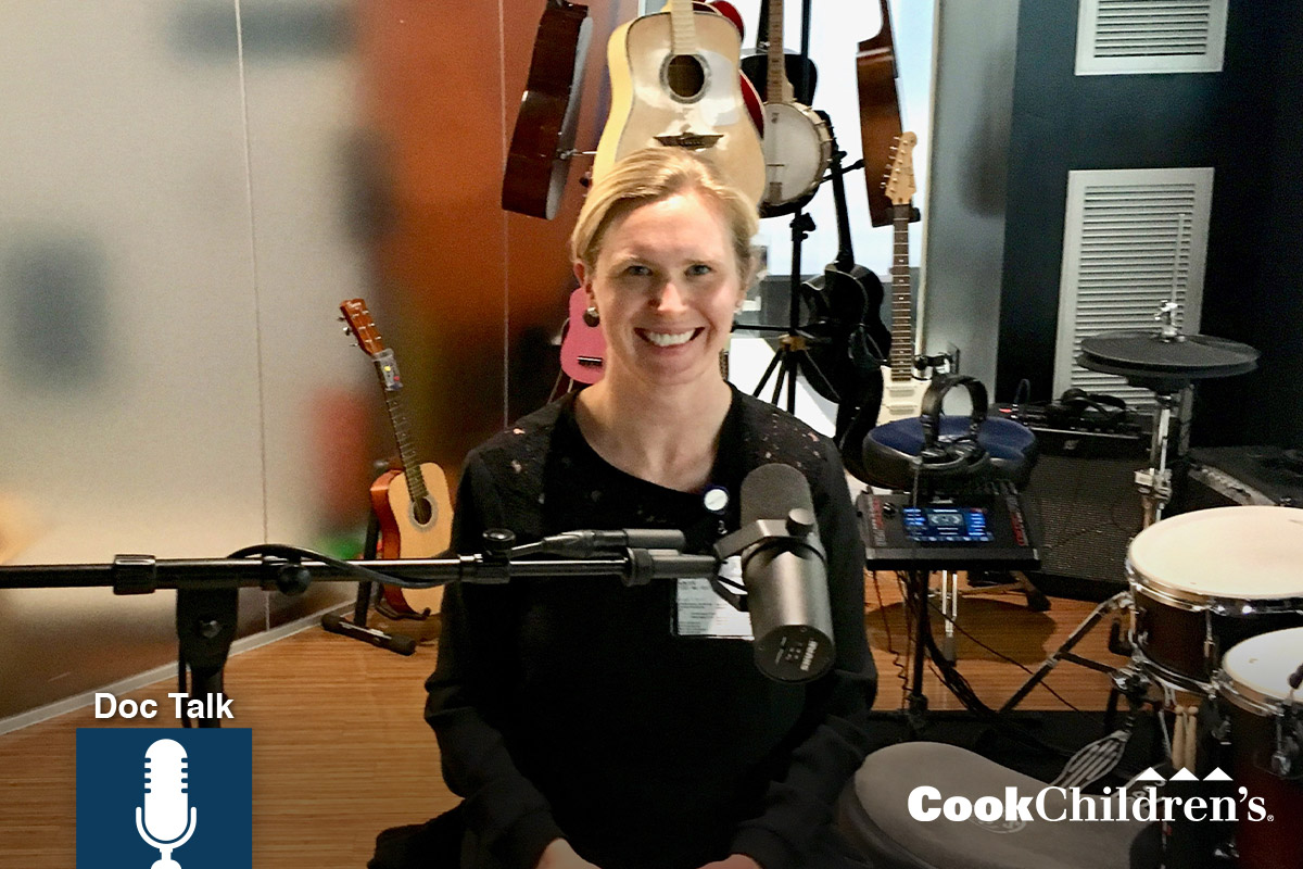 Doctor Pacenta at a microphone in a music studio. Logos: Doc Talk and CookChildren's